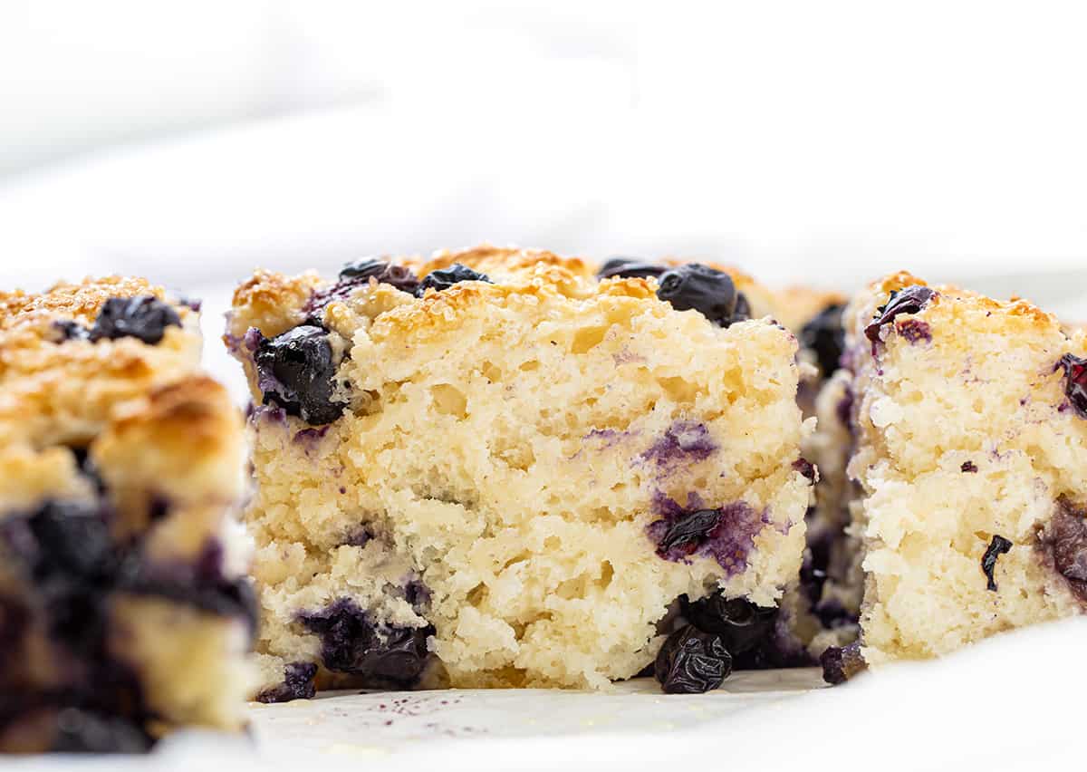 Close up of a Blueberry Butter Swim Biscuit Showing Tender Crumb.