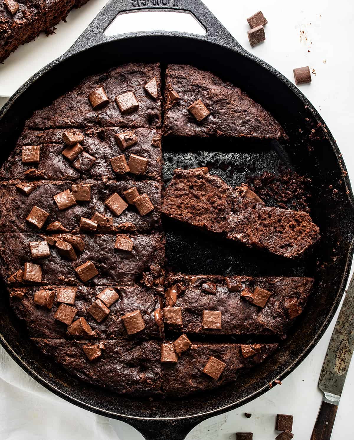 Pan of Chocolate Focaccia Bread Cut Into Strips and a Couple of Pieces Missing and One Piece on Its Side.