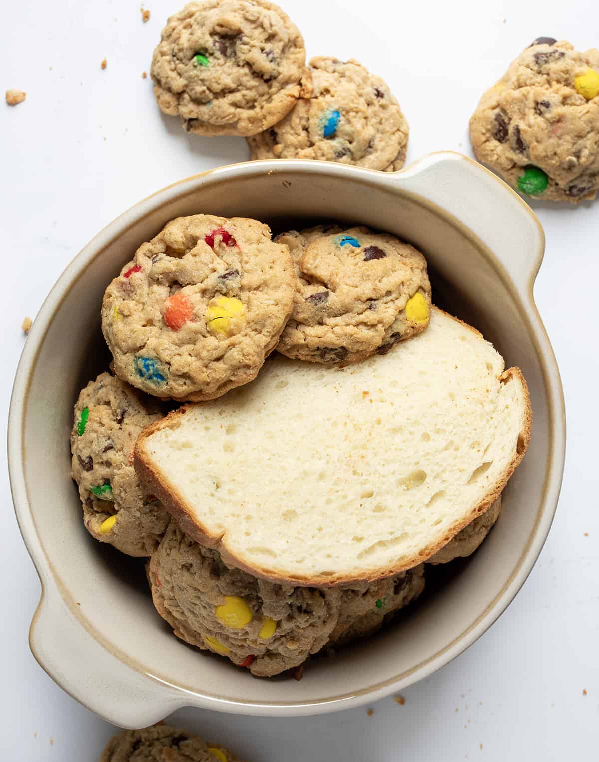 Bowl of Cookies with a Slice of Bread