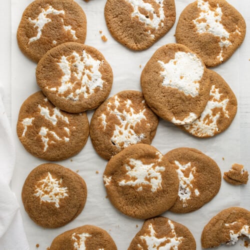 Baked Marshmallow Ginger Cookies on Parchment Paper from Overhead.