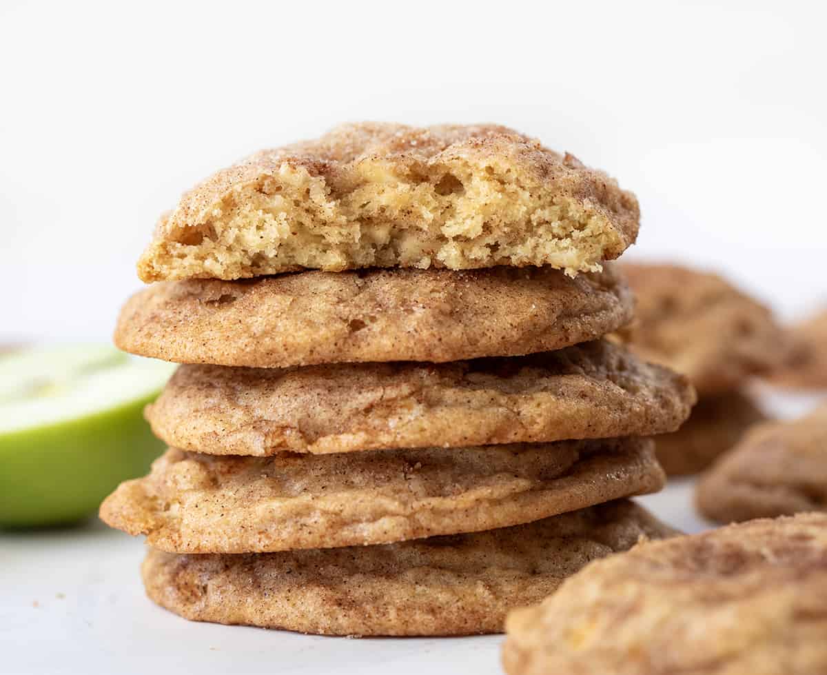 Stack of Apple Snickerdoodles with top cookies halved showing inside texture.