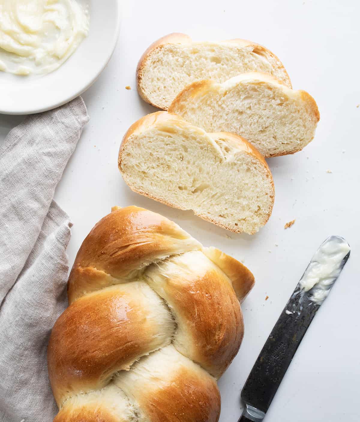 Sliced Easy Challah Bread with Butter.