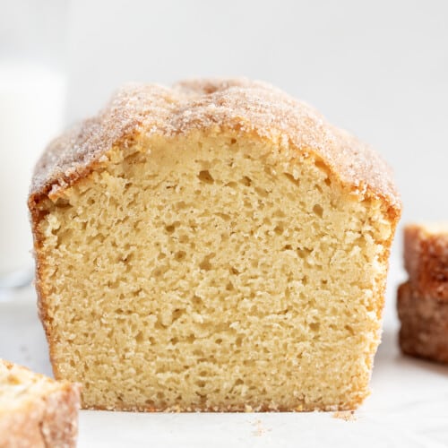 Loaf of Cinnamon Sugar Donut Bread with Pieces Cut Off showing Inside Texture.