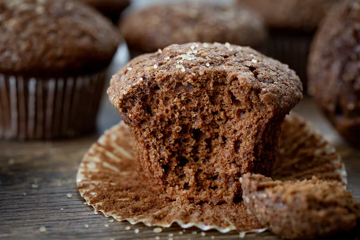 Close up of a bit into Gingerbread Muffins Showing tender inside texture.