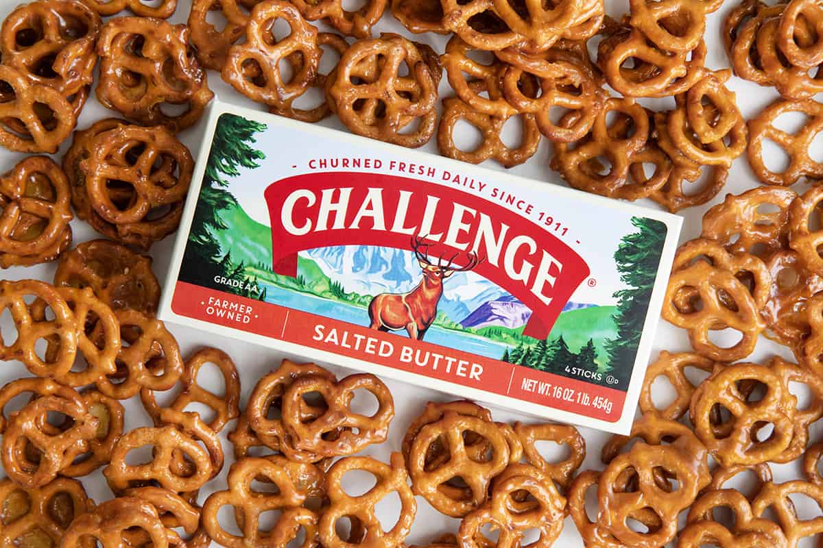 Chocolate covered Butter Toffee Pretzels with a box of Challenge butter.
