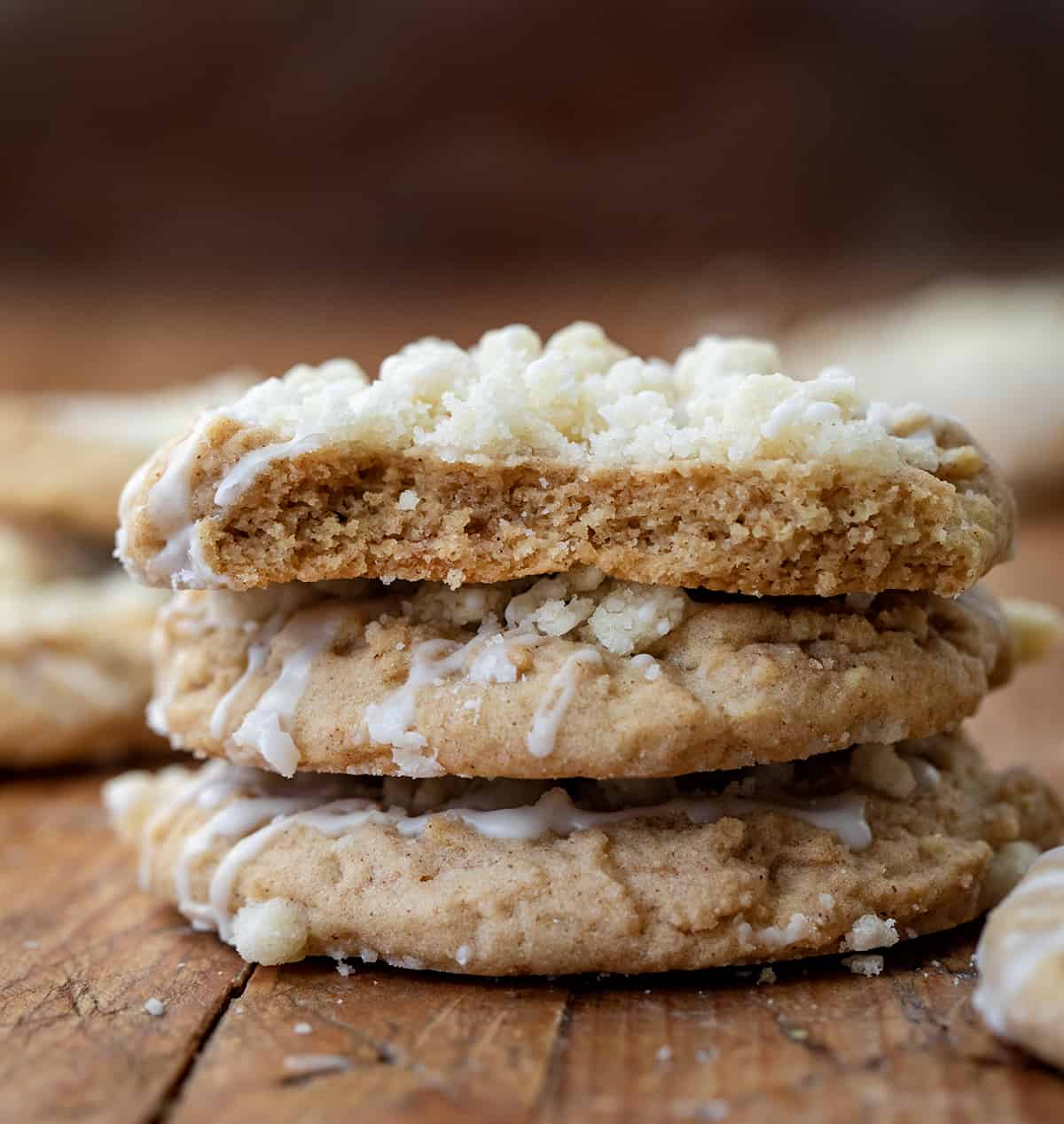 Stack of Coffee Cake Cookies with top cookie havled showing inside texture.
