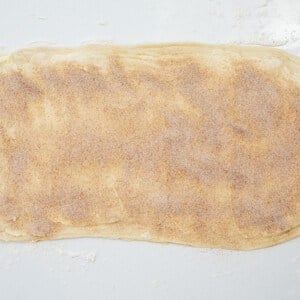 Adding Cinnamon Sugar to Croissant Dough to Make Cruffins.