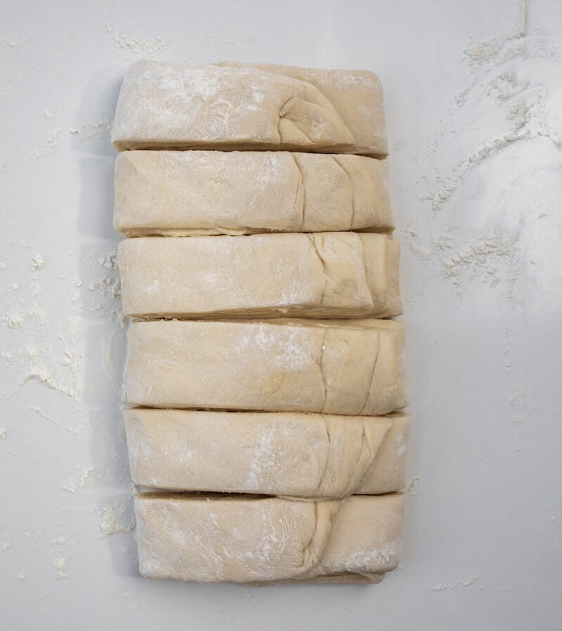 Dividing up Dough to Make Cruffins.