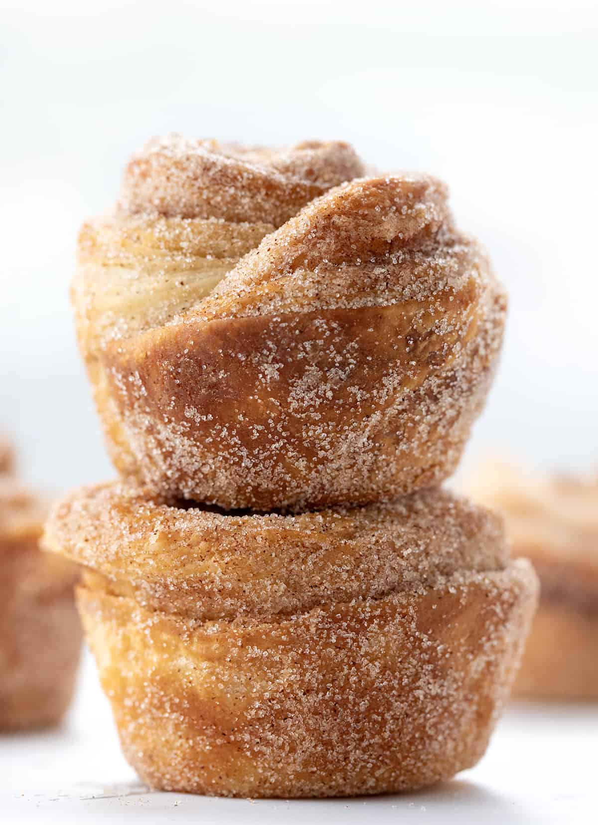 Stacked Homemade Cruffins on a White Counter.