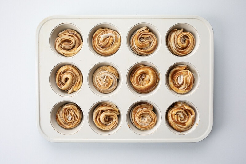 Pan of pumpkin cruffin dough.