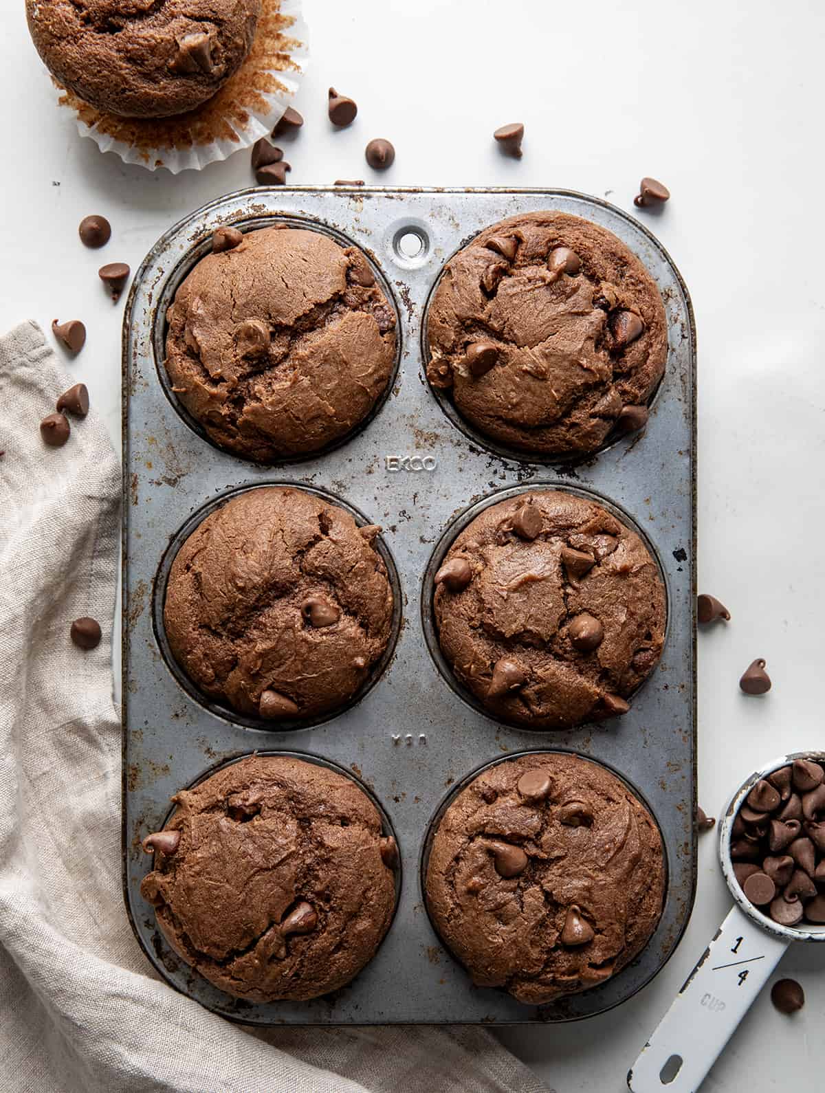 Chocolate Cream Cheese Muffins in a muffin pan from overhead.