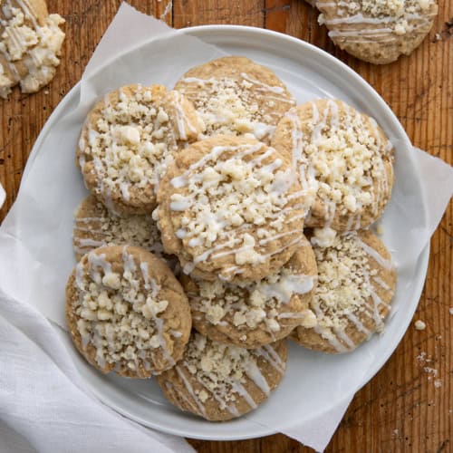 Plate of Coffee Cake Cookies on a wooden table from overhead.