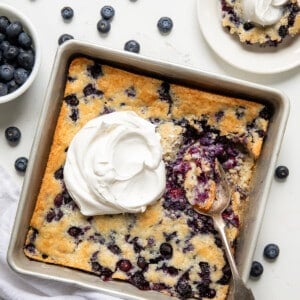 Pan with Bisquick™ Blueberry Cobbler in it with some removed.