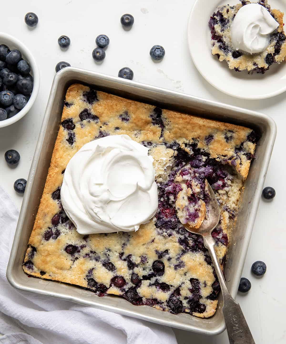 Pan with Bisquick™ Blueberry Cobbler in it with some removed. 