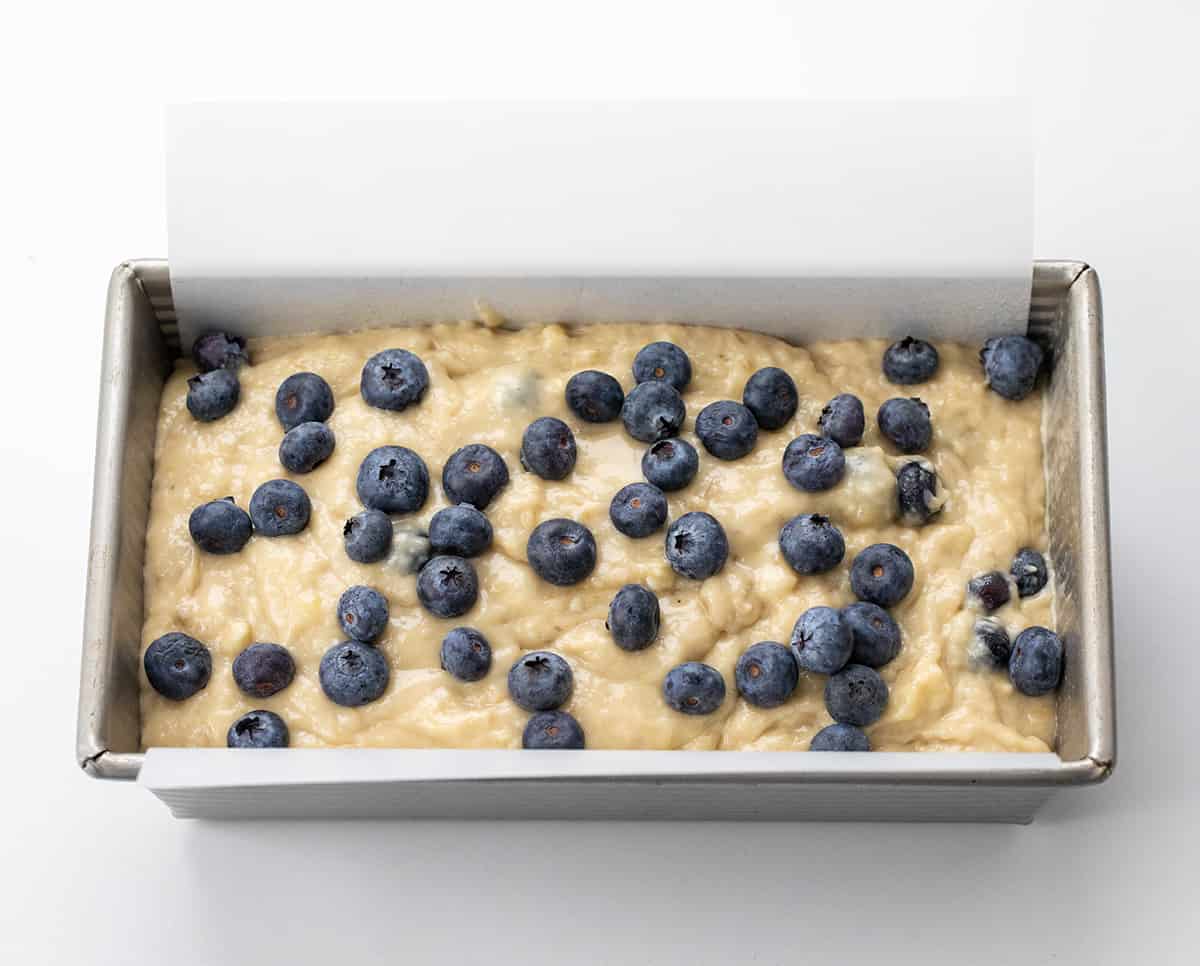 Raw Blueberry Banana Bread bread batter in a pan before baking.