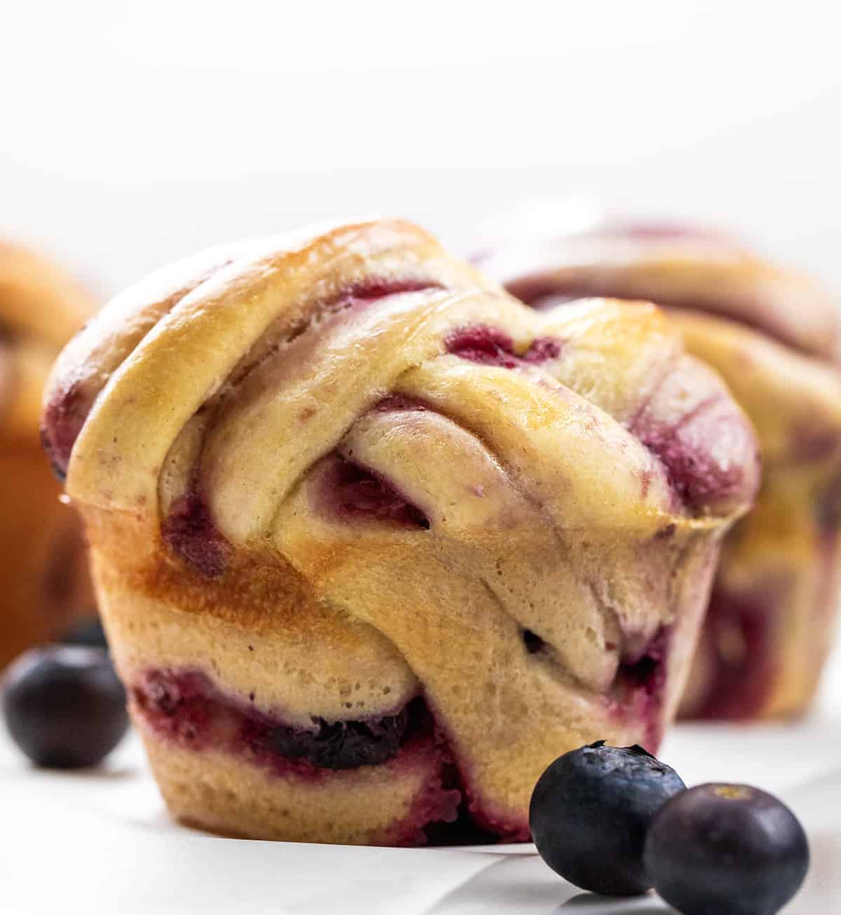 Close up of Muffin Tin Braided Blueberry Roll.