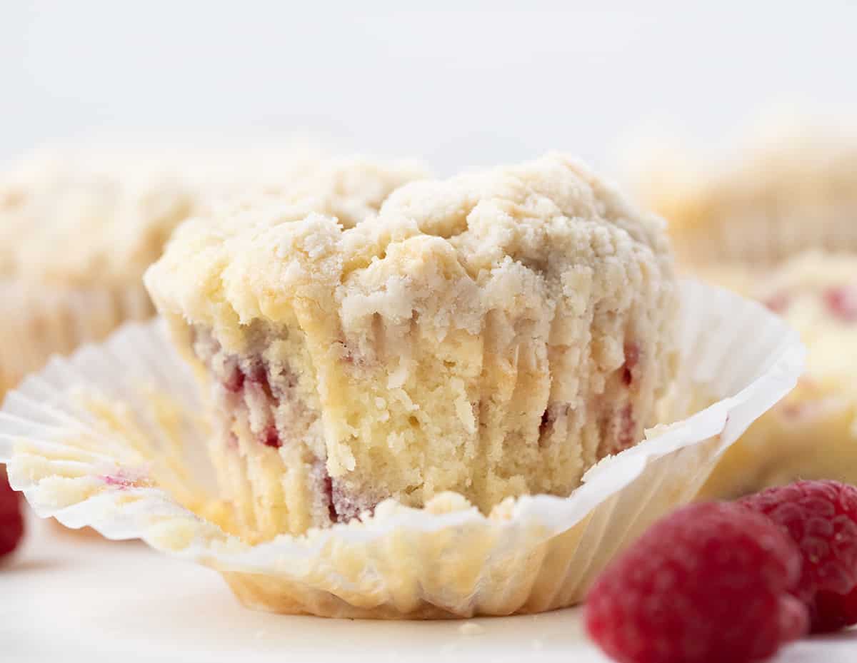 One Raspberry Muffin with the wrapped unwrapped.