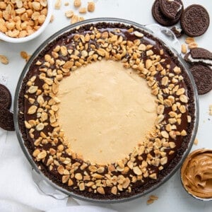 No Bake Buckeye Cheesecake on a white counter from overhead.