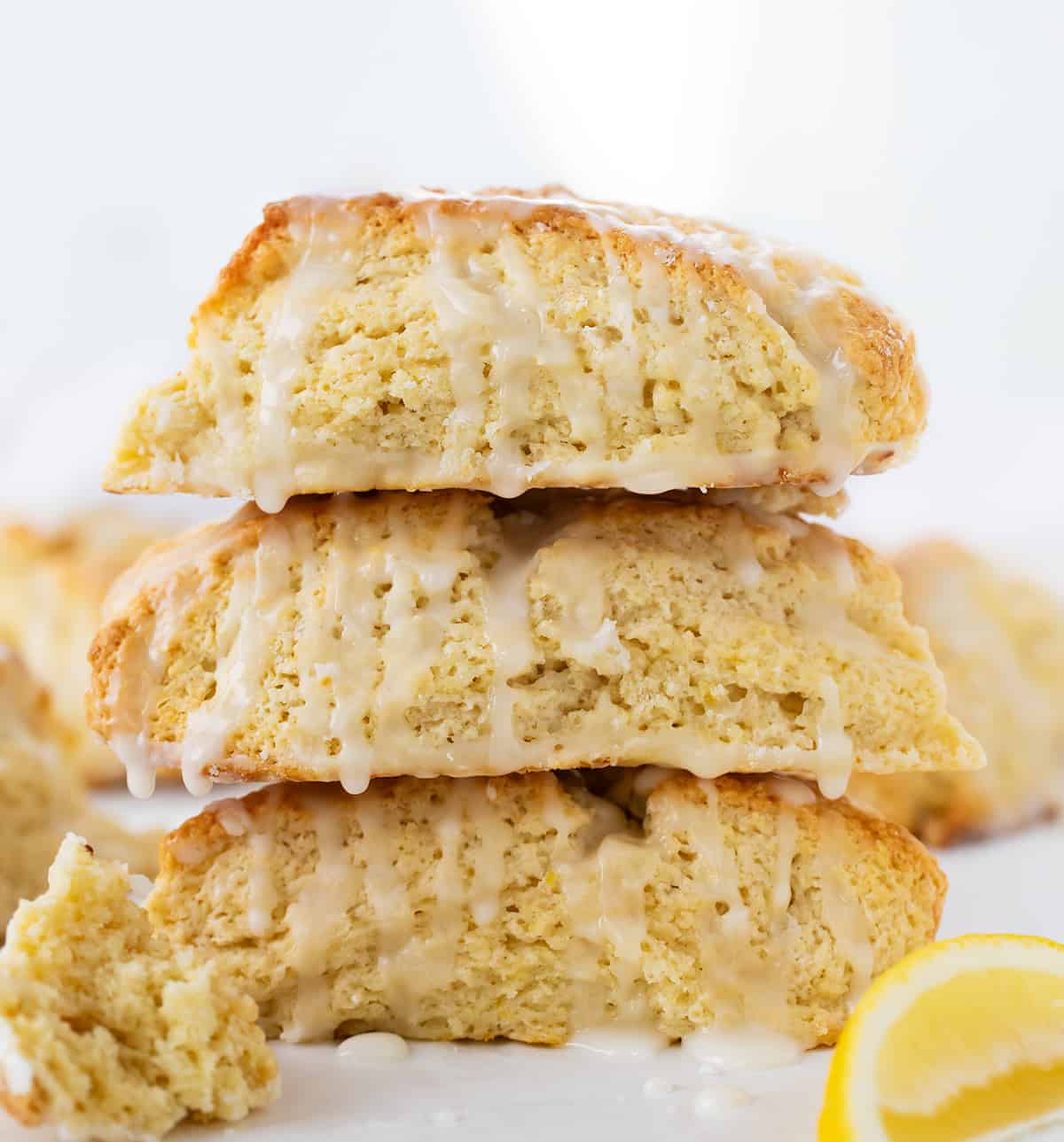 Stack of Lemon Scones with drizzled glaze.