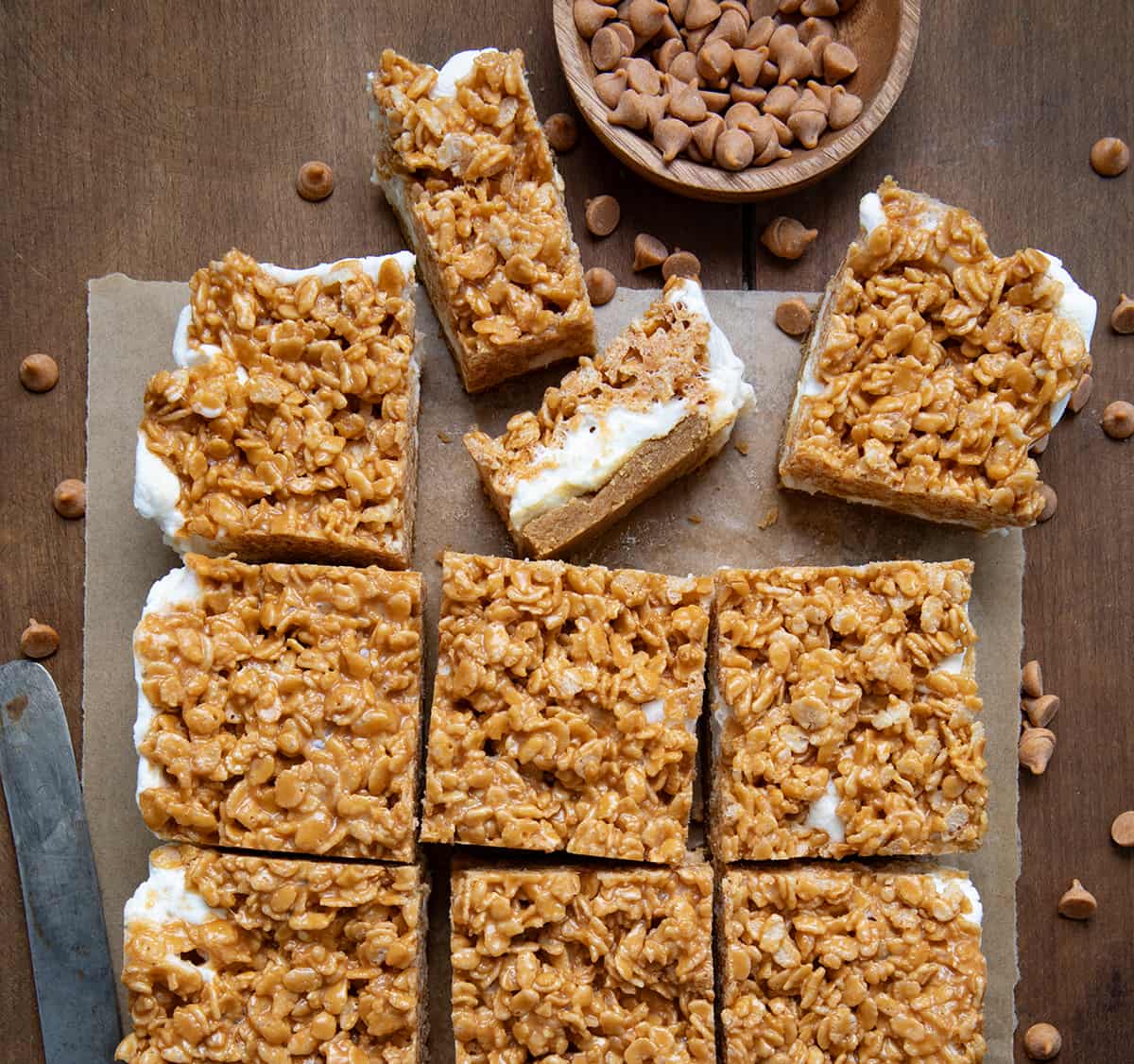 Butterscotch Bars cut into squares and some tipped on their side to show inside layers from overhead.