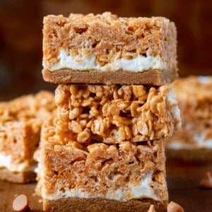 Stack of Butterscotch Bars on a wooden table.