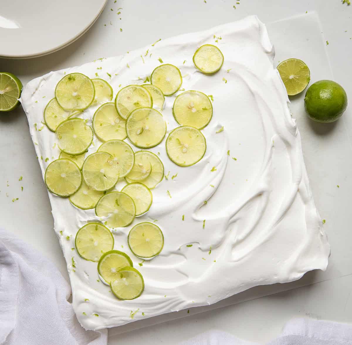 Key Lime Pie Bars on a white table from overhead.