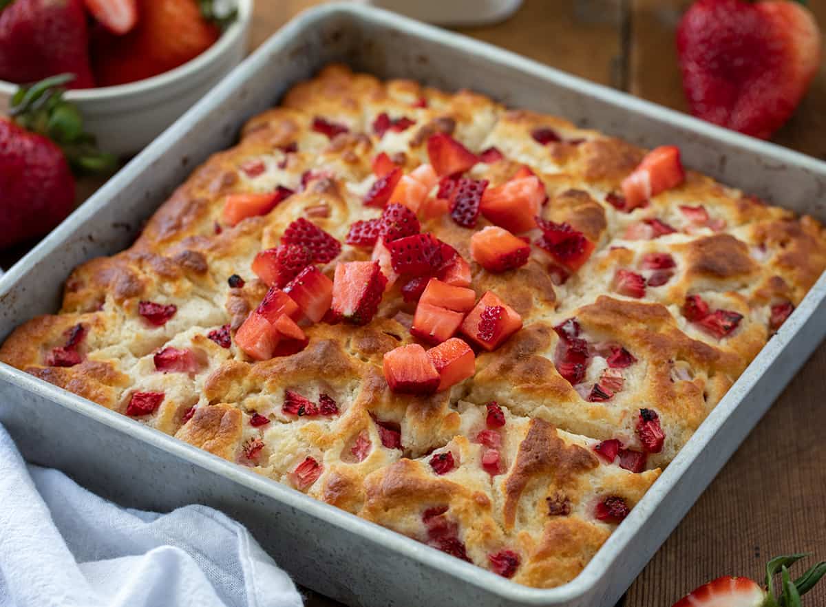 Close up of a pan of Strawberry Butter Swim Biscuits.