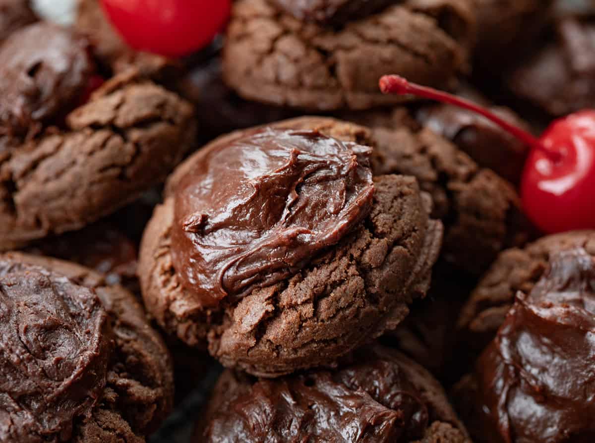 Close up of frosted Chocolate Covered Cherry Cookies.