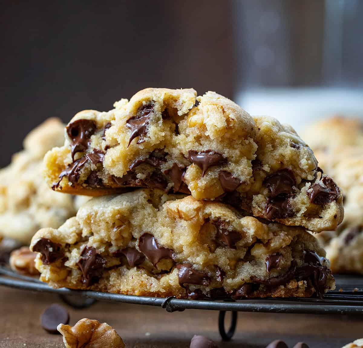 Halved Copycat Levain Bakery Chocolate Chip Cookie on a cooling rack.