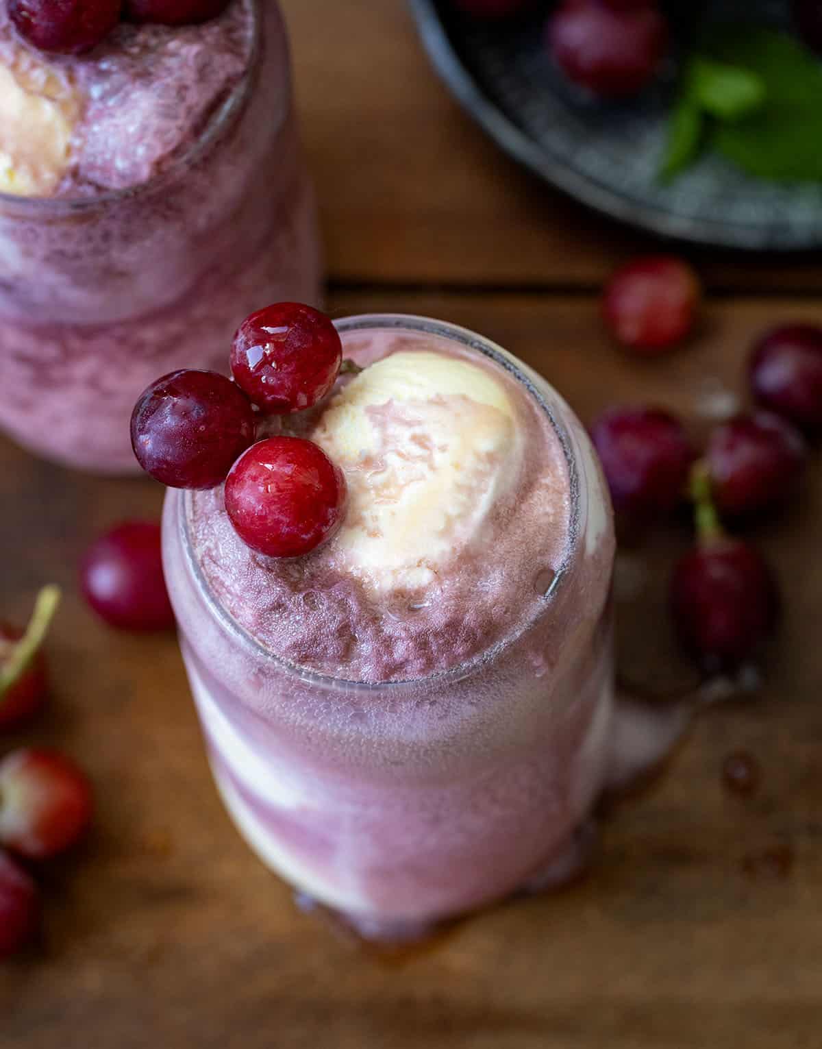 Tops of Dirty Grape Floats showing the soda and ice cream.