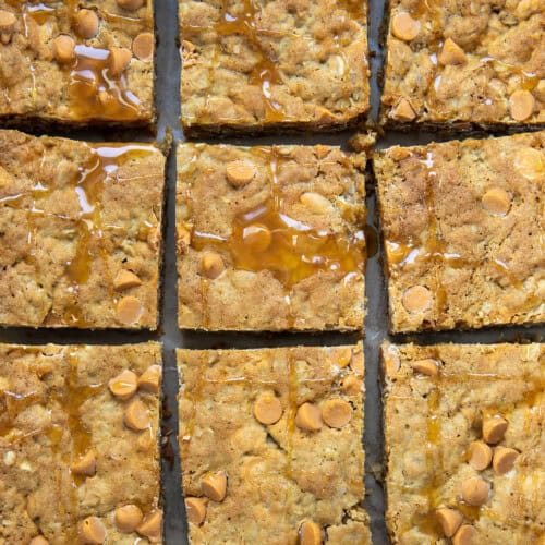 Oatmeal Butterscotch Bars cut into pieces on a table from overhead.