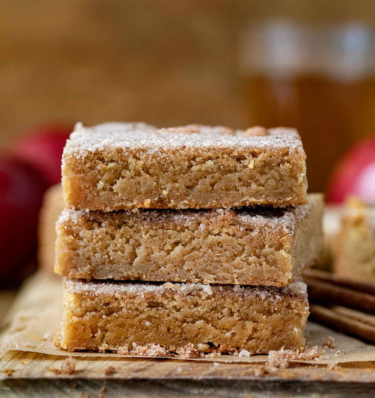 Stack of Apple Cider Blondies on a cutting board very close up showing inside texture.