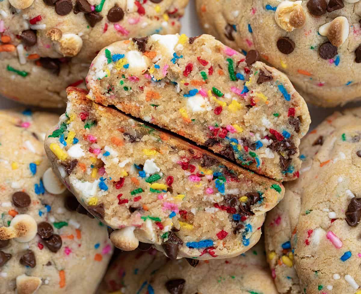 Thick and Chewy Sprinkles Cookies cut in half showing inside texture.