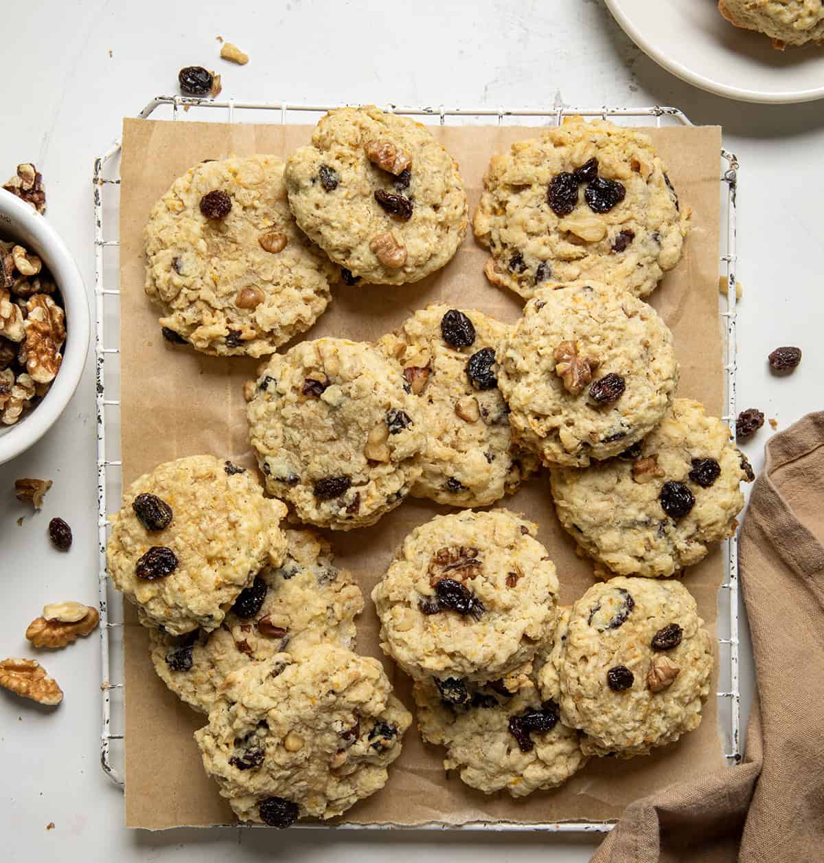 Cooling rack on a white table with School Day Cookies laid out on them from overhead.