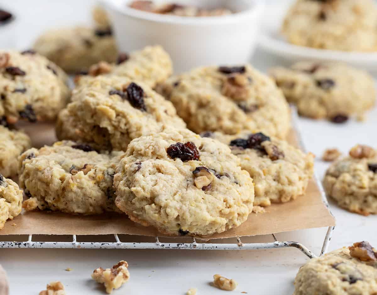 School Day Cookies on a cooling rack with parchment paper and walnuts and raisins.