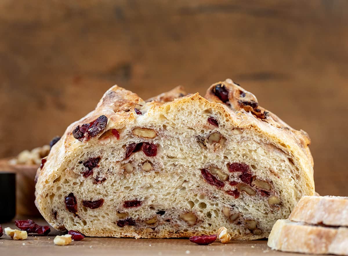 Cut into Cranberry Walnut Bread showing the inside texture of the loaf.