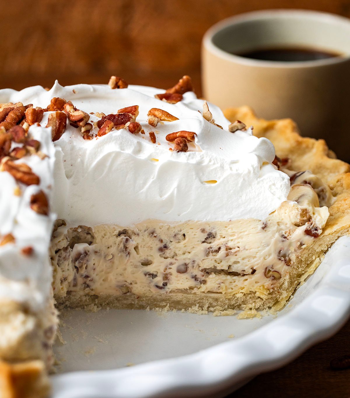 Pecan Cream Pie in the pan with a couple of pieces removed showing the leftover pie.