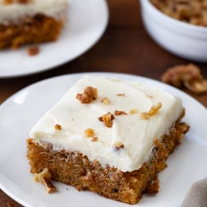 Carrot Cake Bars on white plates close up.