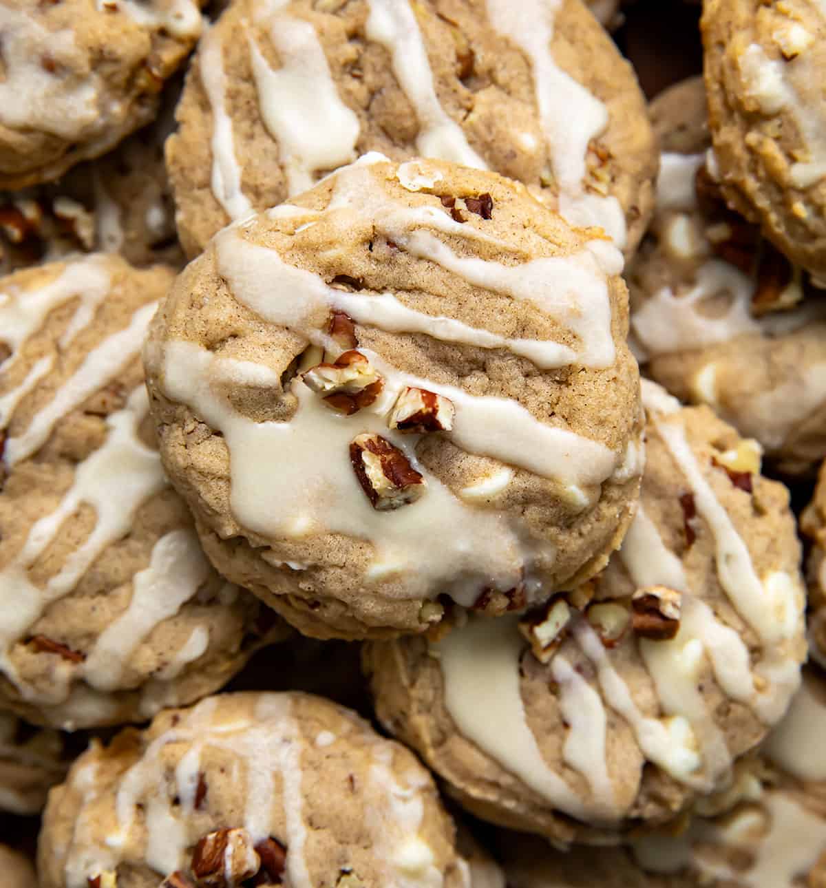 Close up of White Chocolate Maple Pecan Cookies stacked.