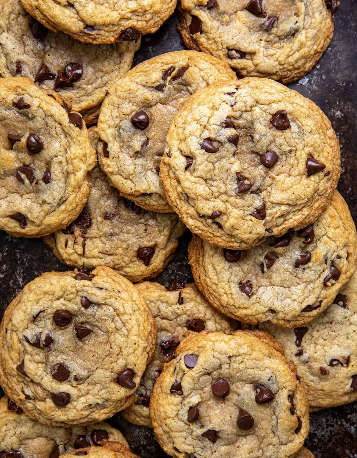 Bourbon Browned Butter Chocolate Chip Cookies on a wooden table from overhead.