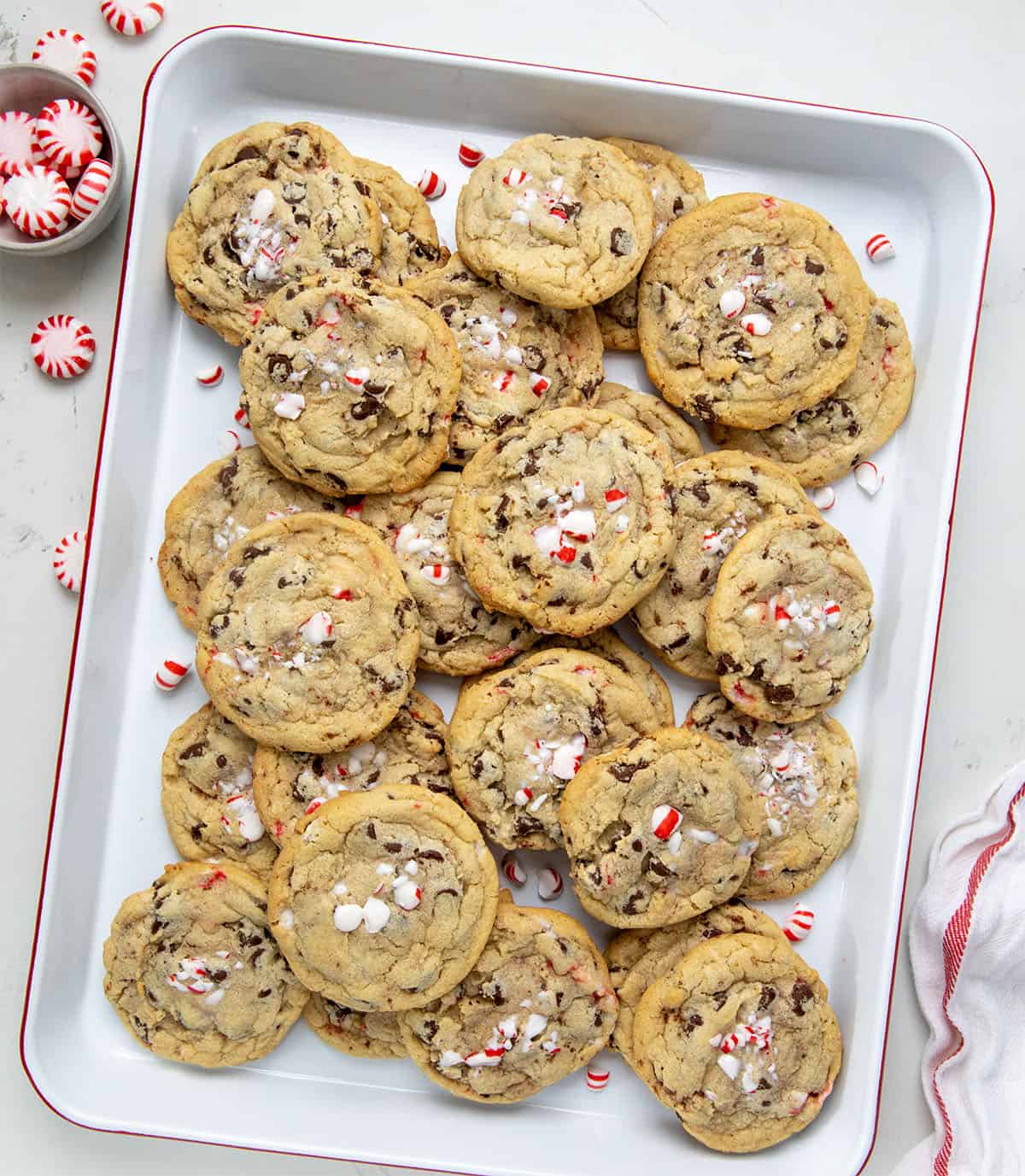 Tray of Peppermint Chocolate Chip Cookies on a white table from overhead.