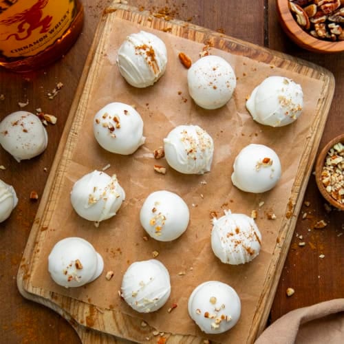 Fireball Truffles on a wooden table from overhead.