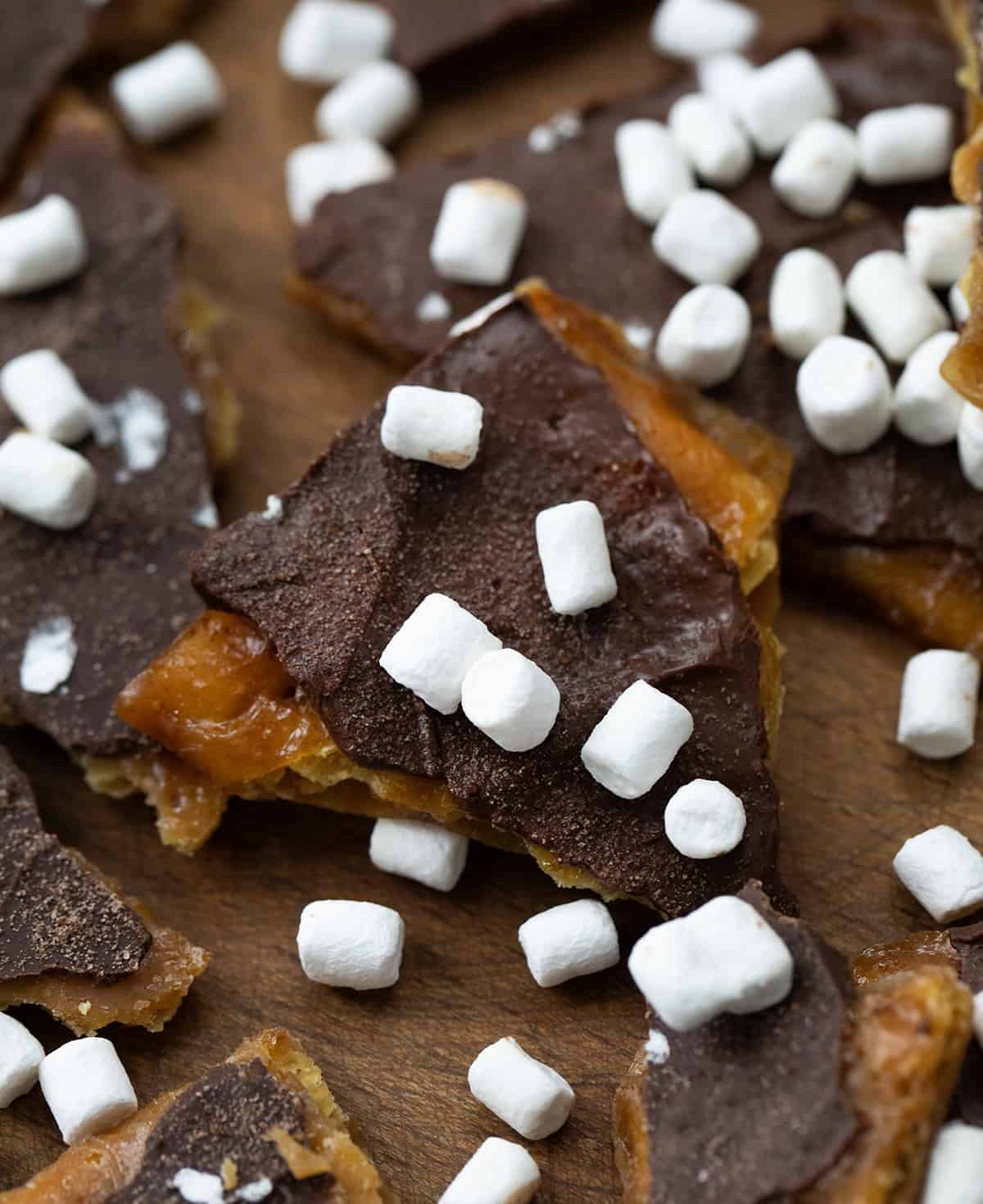 CLose up of a piece of Hot Cocoa Christmas Crack surrounded by other pieces.