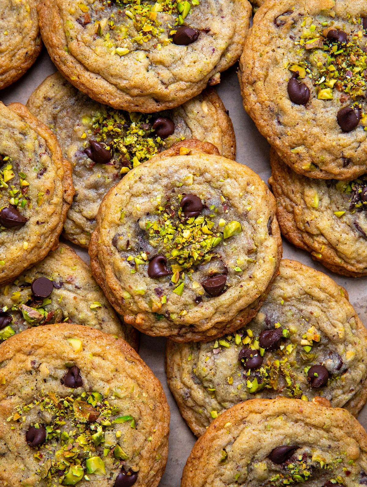 Pistachio Chocolate Chip Cookies laid out flat shot from overhead.