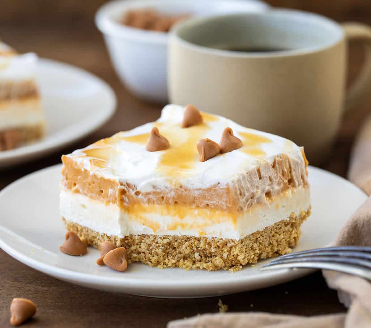 Plate of Butterscotch Delight with a bite taken out of it and the fork resting on the plate.