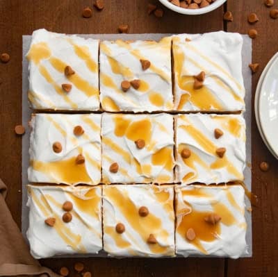 Butterscotch Delight cut into squares on a wooden table from overhead.