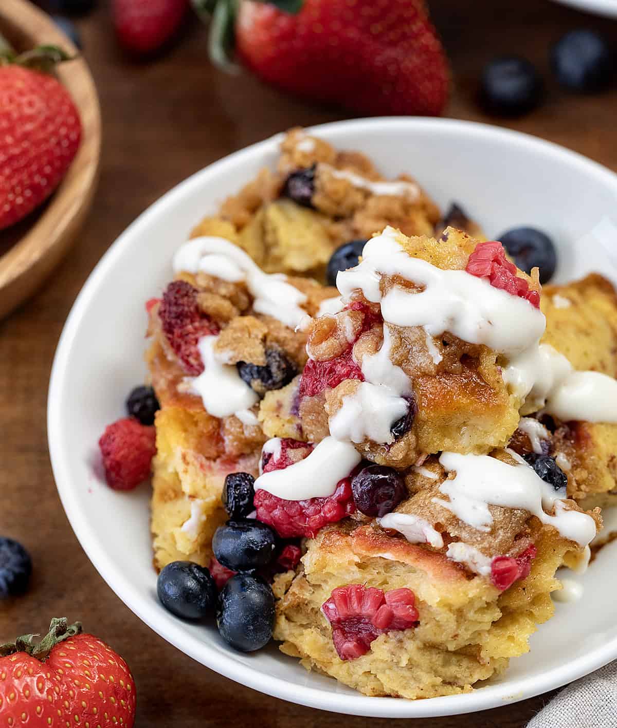 Close up of a bowl of Berries and Cream Overnight French Toast Bake.