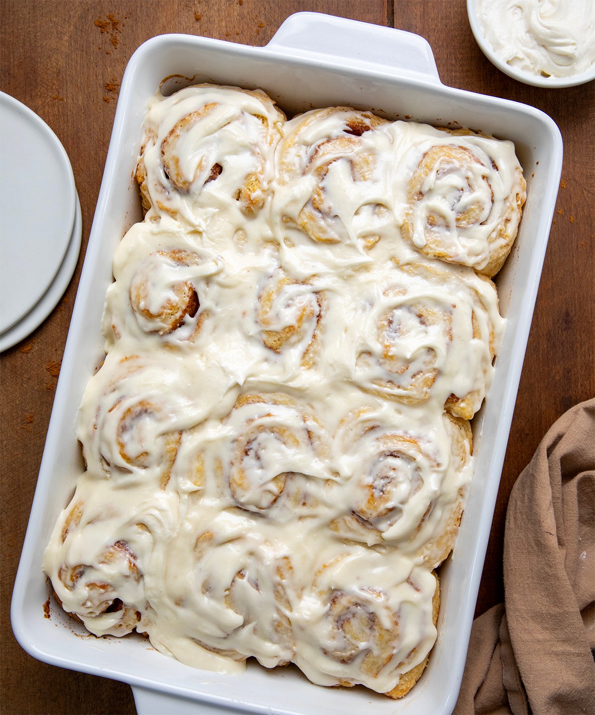 Pan of Biscuit Cinnamon Rolls on a wooden table from overhead.