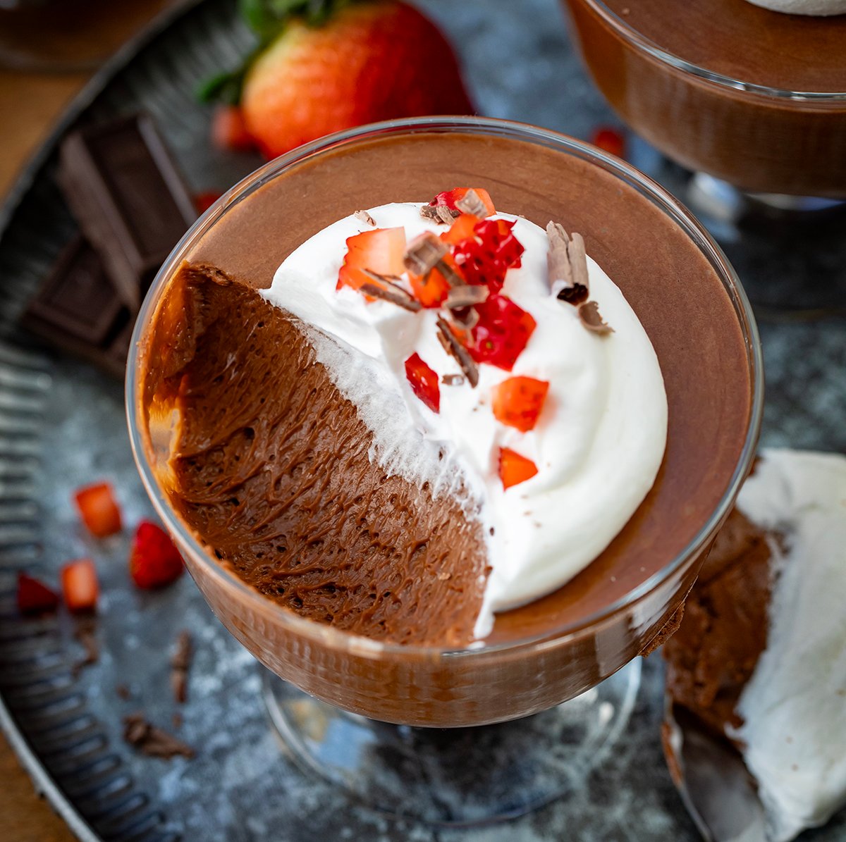 Chocolate Marshmallow Mousse with a scoop removed showing tender texture inside the cup.