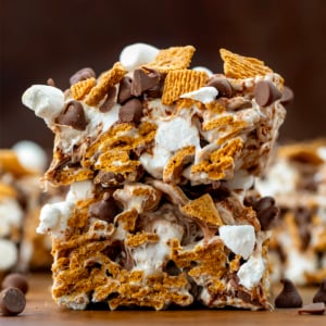 Stacked S'mores Bars on a wooden table close up.